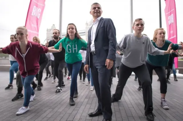 Sadiq Khan joins Londoners from across the capital as they do their warm-ups at City Hall for the International Big Dance Pledge