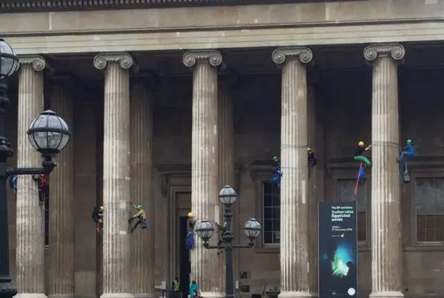 Protesters climbing British Museum columns