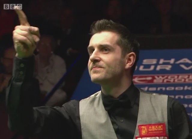 Mark Selby celebrates winning the title