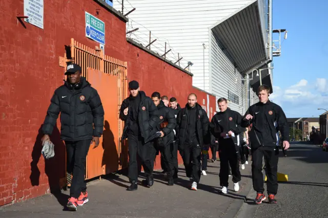 Dundee United players make the short walk to Dens Park