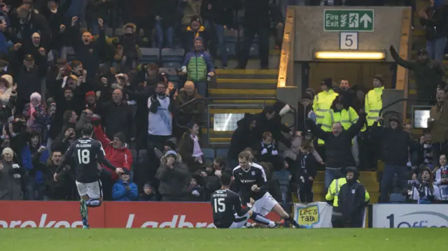 Dundee's Kane Hemmings celebrates having scored an equaliser for his side