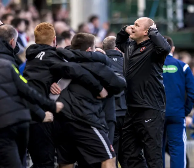 Dundee United manager Mixu Paatelainen (right) taunts the Dundee fans