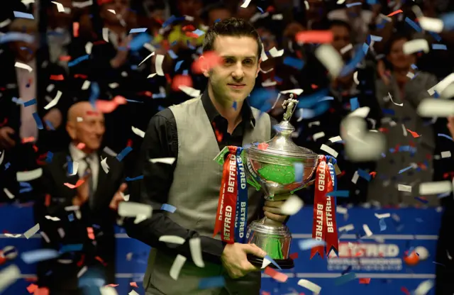 Mark Selby with the world championship trophy