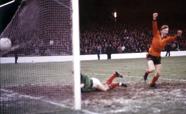 Dundee goalkeeper Bobby Geddes lies helpless as Davie Dodds turns away to celebrate in the 1979/80 final