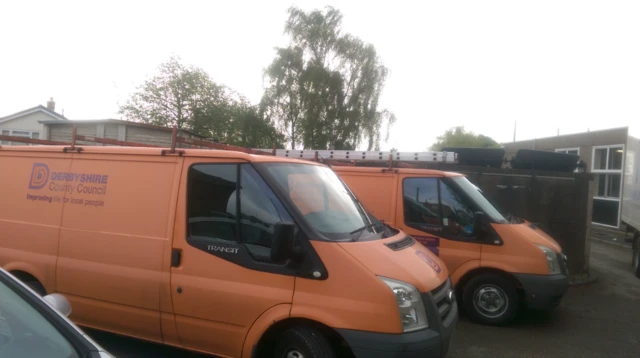 Derbyshire County Council vans parked at St John's Church of England Primary School in Belper for clean-up operation