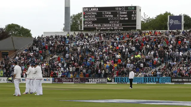 Fans build a beer snake