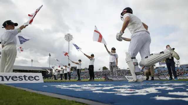 Jonny Bairstow enters the field