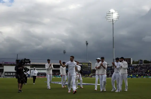 Players leave the field