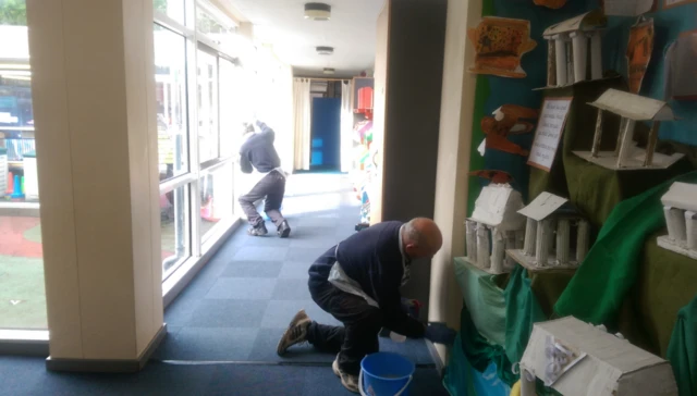 Workforce disinfecting surfaces at St John's Church of England Primary School in Belper after a sickness bug