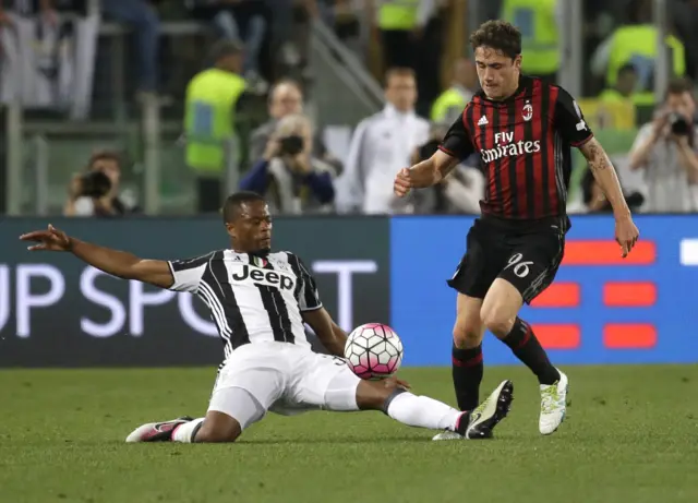 Patrice Evra, left, and AC Milan"s Davide Calabria