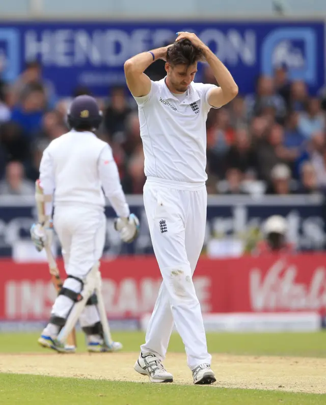 Steven Finn looks dejected