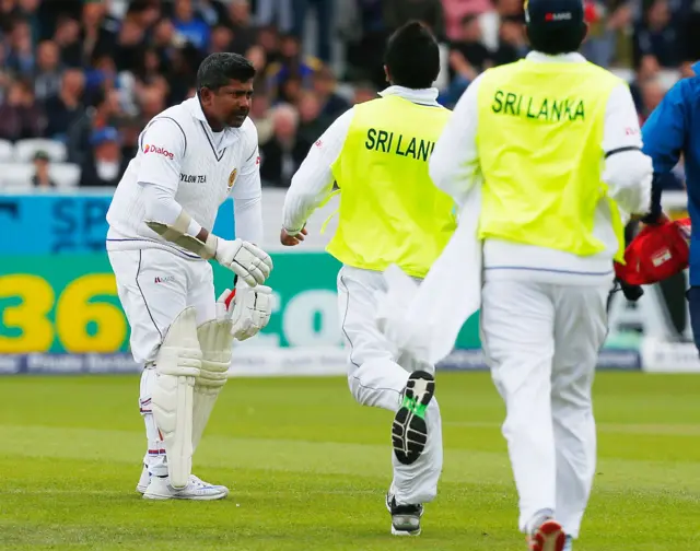 Rangana Herath receives treatment for an injury