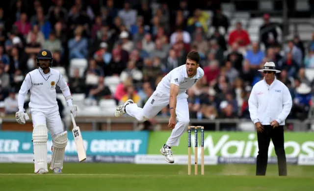 Steven Finn bowls