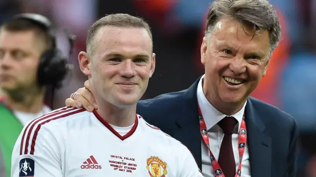 Louis van Gaal and Wayne Rooney celebrate