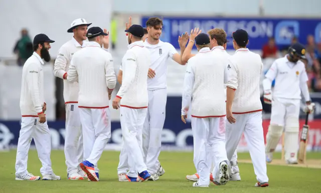 Players celebrate Sri Lankan wicket