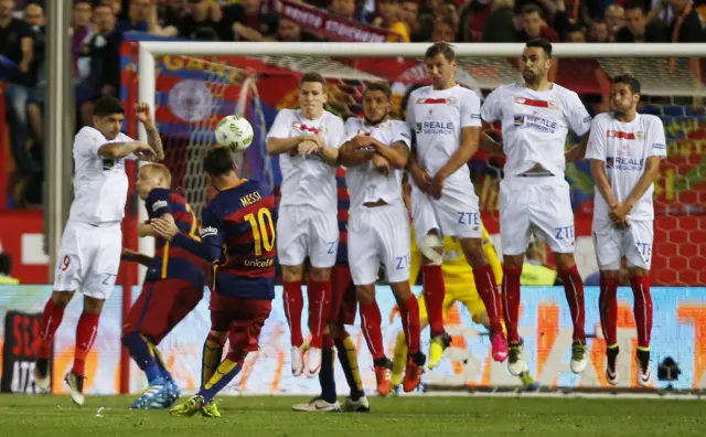 Lionel Messi takes a free-kick