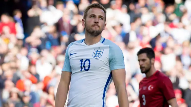 Harry Kane looks up after missing a penalty