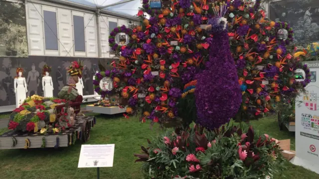 A peacock made from flowers