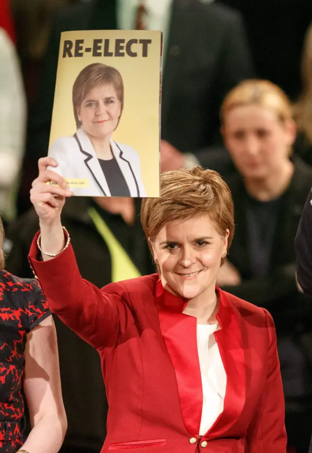 First Minister Nicola Sturgeon with the SNP manifesto