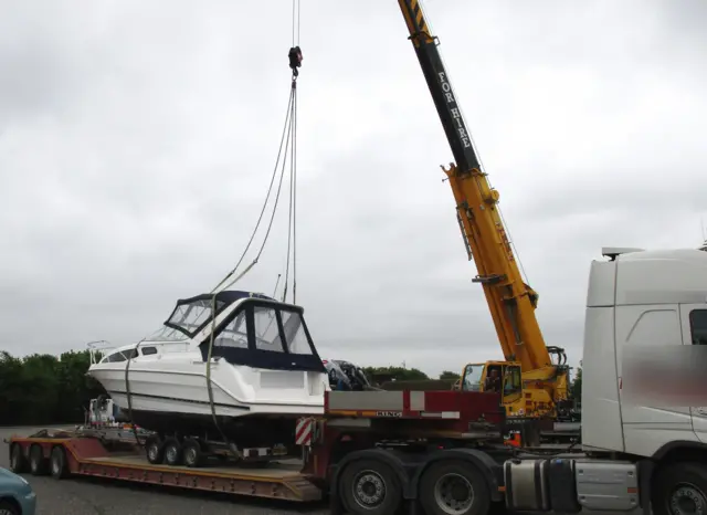 Boat loaded on lorry