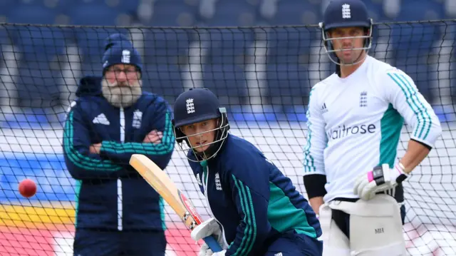 Graeme Fowler watches Joe Root in the nets