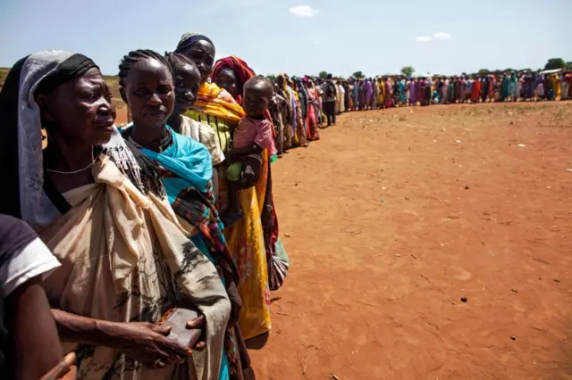 South Sudanese form a long queue to be registered as internally displaced persons