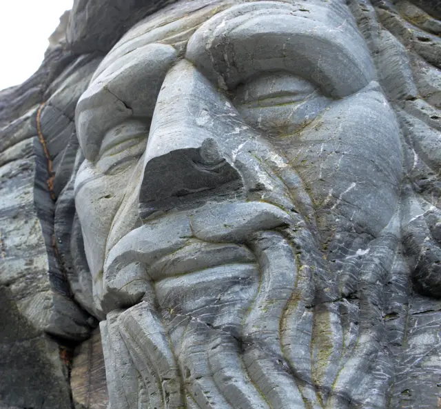 Merlin carving at Tintagel Castle