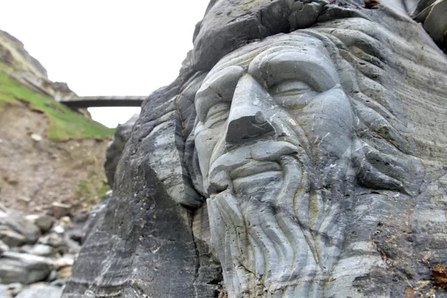 Merlin carving Tintagel Castle