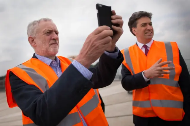 Jeremy Corbyn (left) and his predecessor Ed Miliband visit Vulcan Renewables