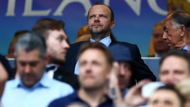 Manchester United chief executive Ed Woodward looks on