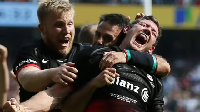 Alex Goode celebrates