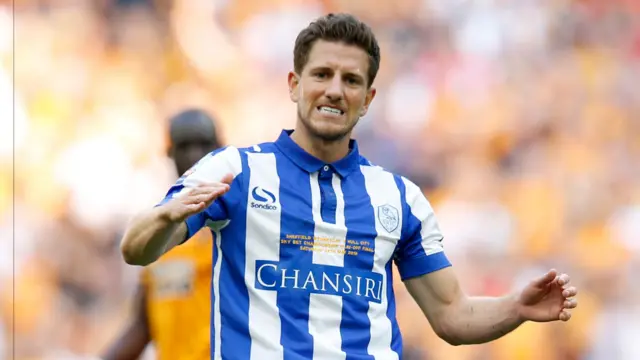 Sam Hutchinson reacts