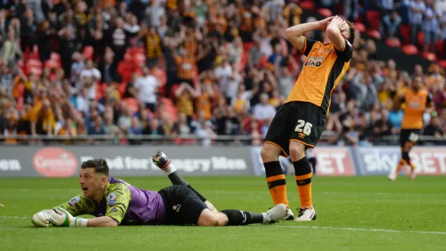 Andrew Robertson looks dejected