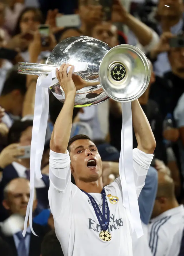 Cristiano Ronaldo lifts the trophy