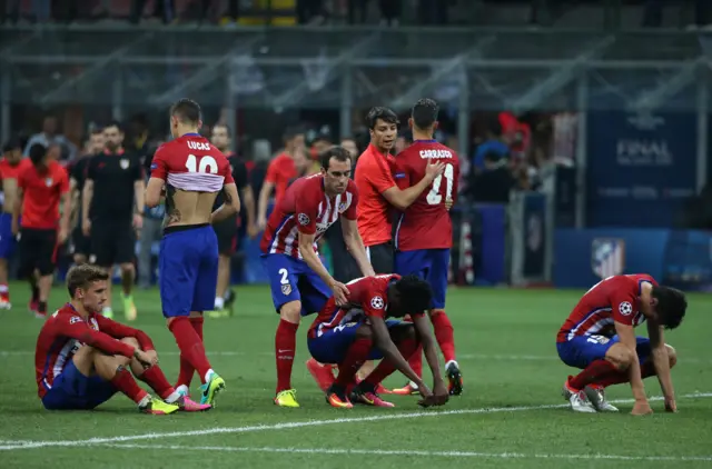 Atletico players look dejected