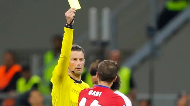 Gabi is shown a yellow card