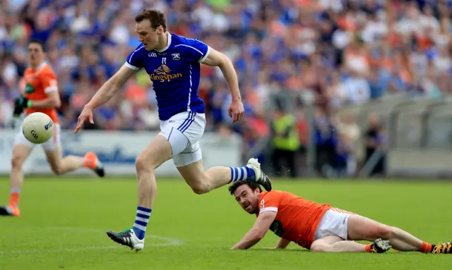 Gearoid McKiernan of Cavan in action against Ethan Rafferty of Armagh