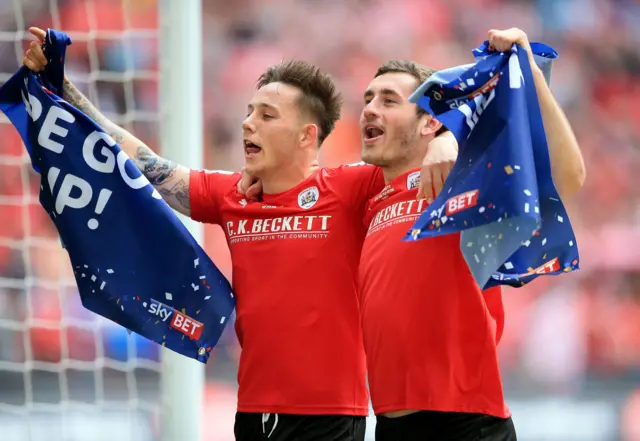 Josh Scowen and Josh Brownhill celebrate