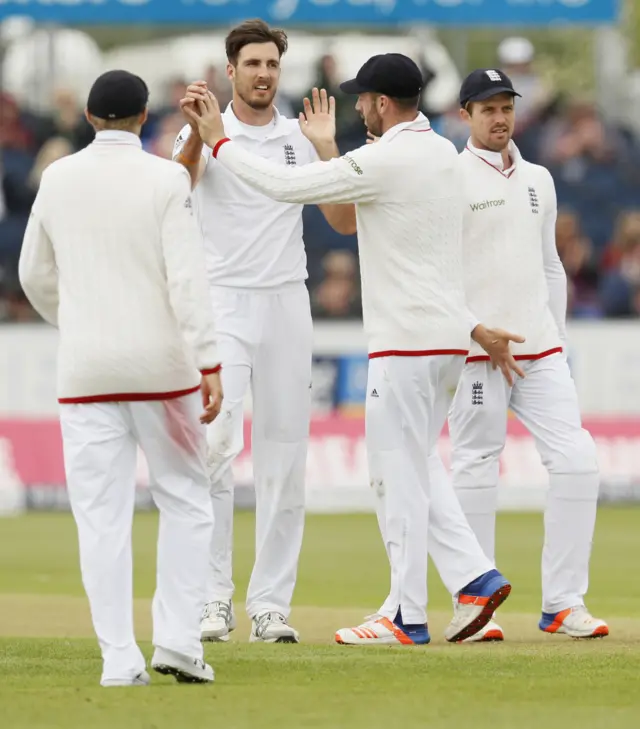 Steven Finn celebrates