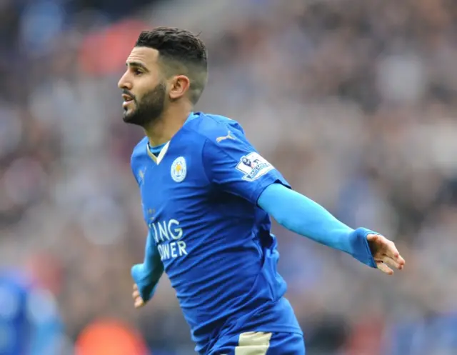 Riyad Mahrez celebrates after scoring during he English Premier League soccer match between Leicester City and Swansea City