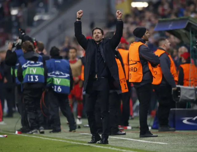 Atletico Madrid coach Diego Simeone celebrates after the game