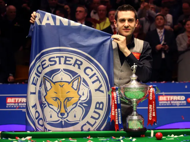 Mark Selby celebrates