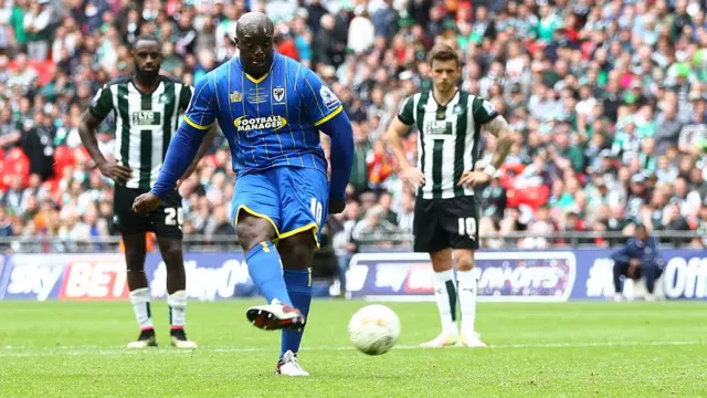 Adebayo Akinfenwa scores a penalty