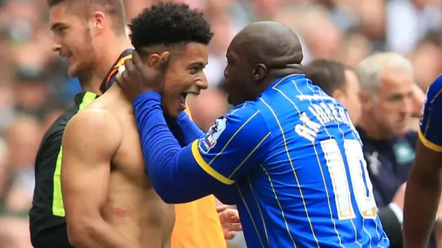 Lyle Taylor celebrates