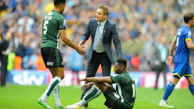 Plymouth Argyle's Curtis Nelson looks dejected