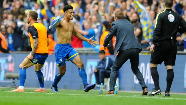 Lyle Taylor celebrates