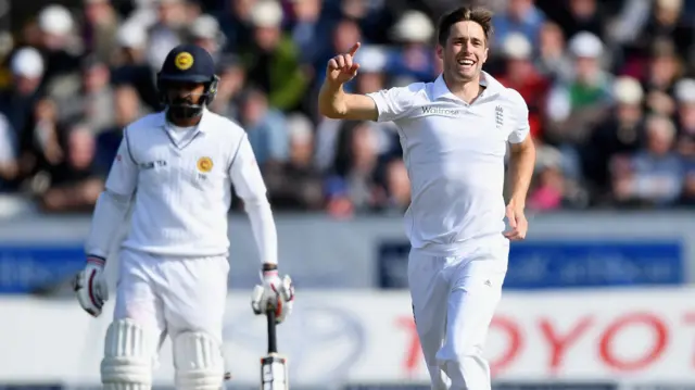 Chris Woakes celebrates a wicket