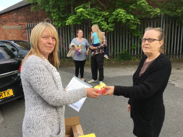 Diane Hanrahan has been distributing fly paper to residents in the New Zealand area of Derby
