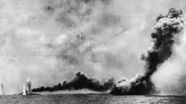 HMS Lion (L) is shelled and HMS Queen Mary is blown up by German shells