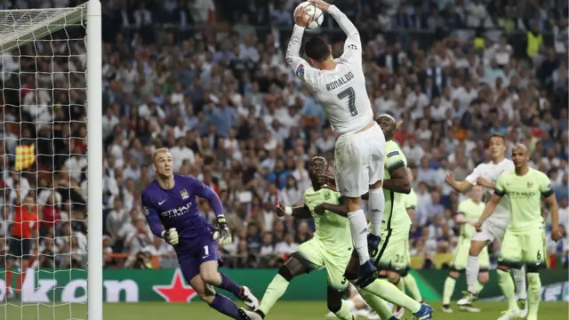 Cristiano Ronaldo throws the ball